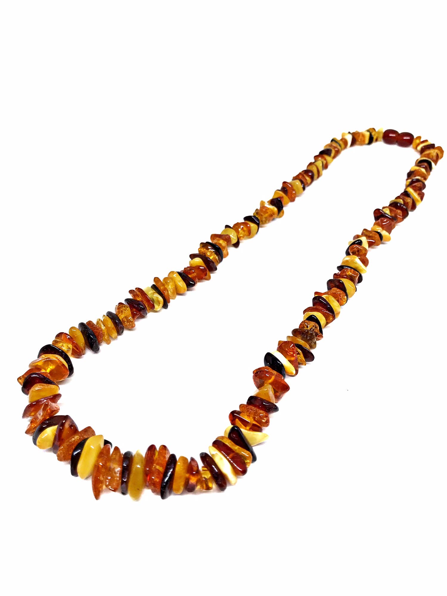 The 18 Multi-Color Amber Chip Necklace features a harmonious blend of polished amber stones in shades of orange and brown.