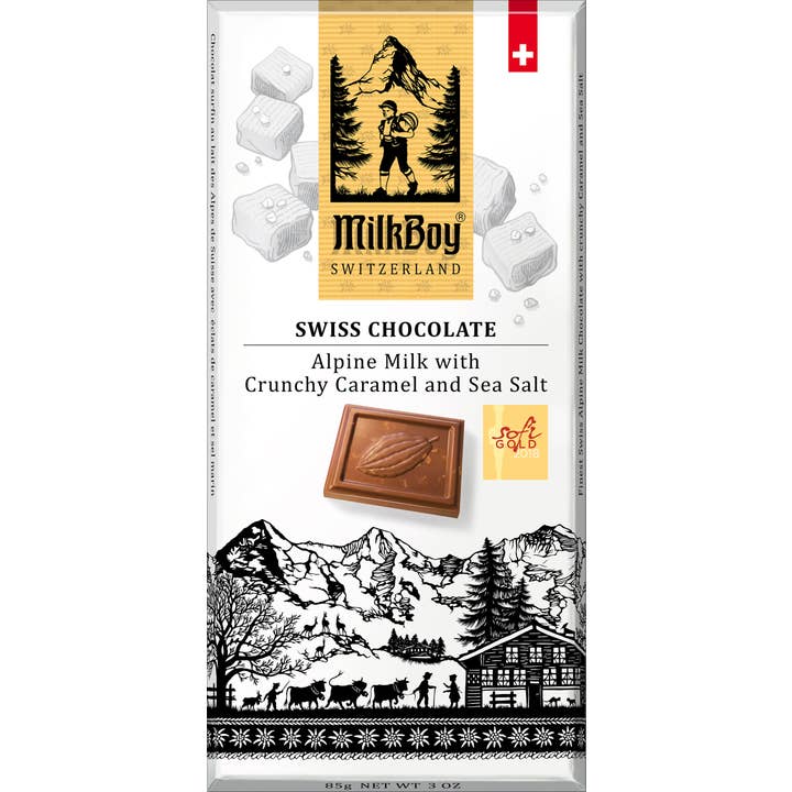 The MilkBoy Swiss Alpine Milk Chocolate with Caramel & Sea Salt 3.5 oz bar features packaging that beautifully showcases Swiss scenery alongside an illustration of the scrumptious chocolate, combining creamy milk chocolate with crunchy caramel and a hint of sea salt.