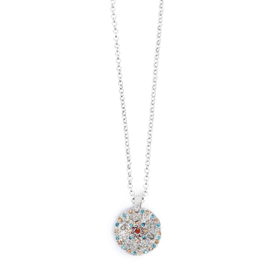 Part of the A&C Oslo Vibrance Collection, the Silver Coin Necklace features a round pendant with colorful stones on a delicate silver chain.