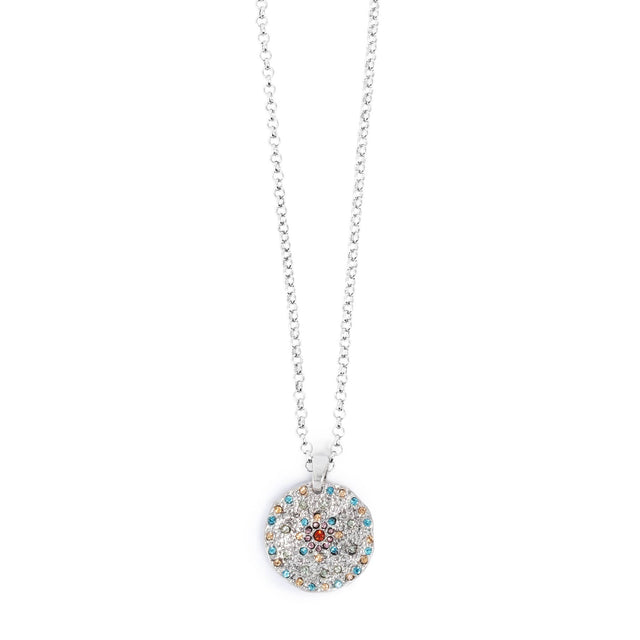 Part of the A&C Oslo Vibrance Collection, the Silver Coin Necklace features a round pendant with colorful stones on a delicate silver chain.