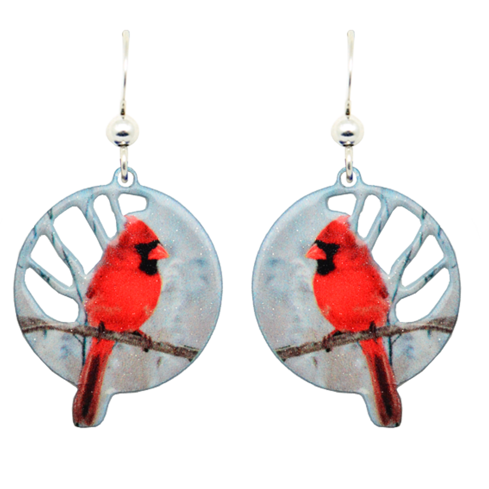 Earrings: Cardinal Earrings with a vivid red cardinal on a branch against a light blue background. Handmade in Minnesota with sterling silver French hooks, these round earrings bring nature-inspired charm to your look.