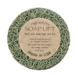 Round Sage Soap Lift® with a label that reads: High and Dry SOAP LIFT. Keep your soap elevated on shower shelves. Made in the USA with eco-friendly bioplastic.