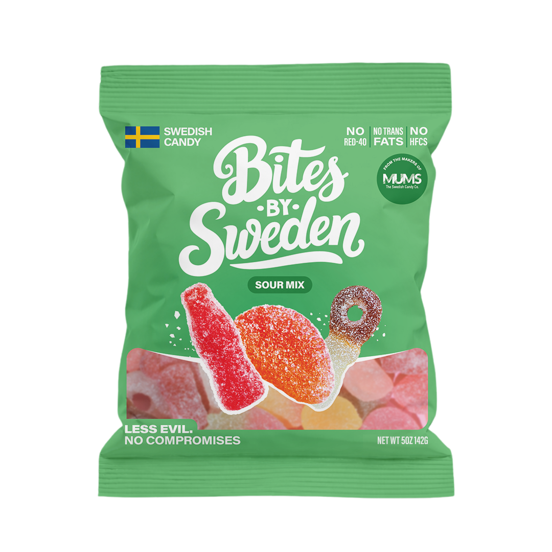 Green bag of sour candies with Swedish flag, colorful fruit illustrations, and visible text noting non-GMO ingredients.