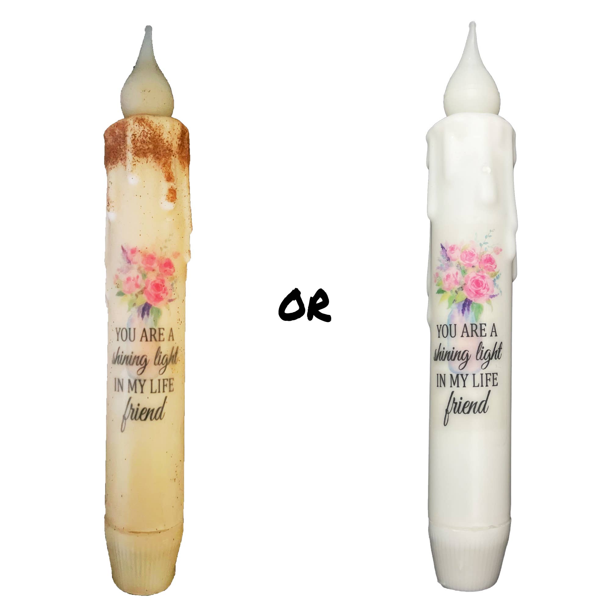 Two battery-operated, pen-shaped LED timer candles with floral designs and YOU ARE a shining light IN MY LIFE friend inscription. One is white with melted wax, the other beige with a burnt look, making them perfect flameless gifts. Product: Candle: Friend Sentiment LED Timer Taper Candles.