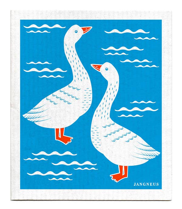 The Swedish Dish Cloth - Geese - Turquoise features two white geese with orange beaks and feet on a blue background with white clouds, radiating Scandinavian style.