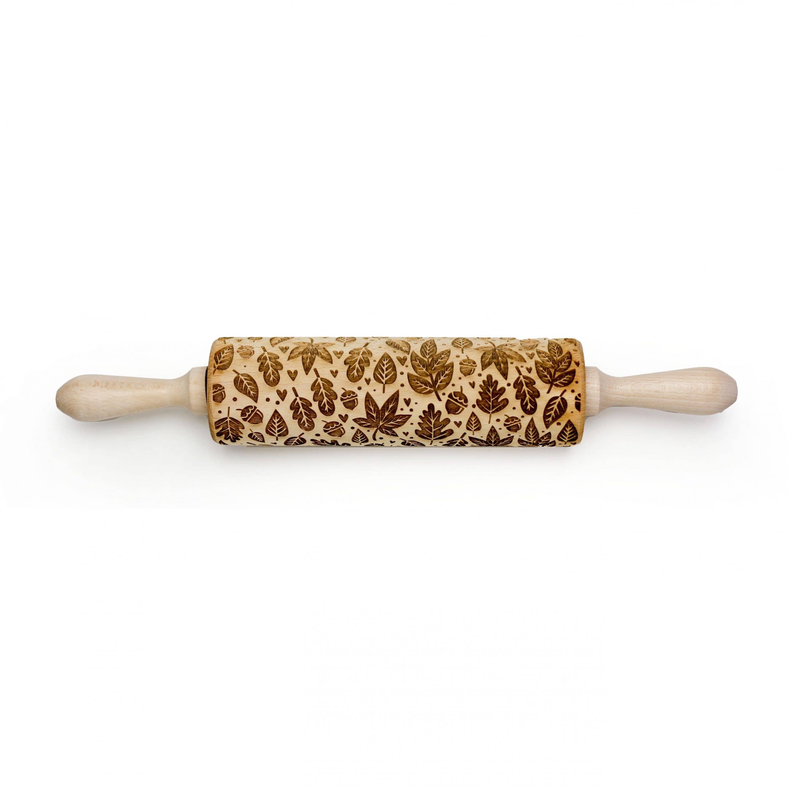 The Autumn Leaves Embossing Rolling Pin is beautifully handmade from beech wood with laser-engraved leaf patterns and equipped with two handles.