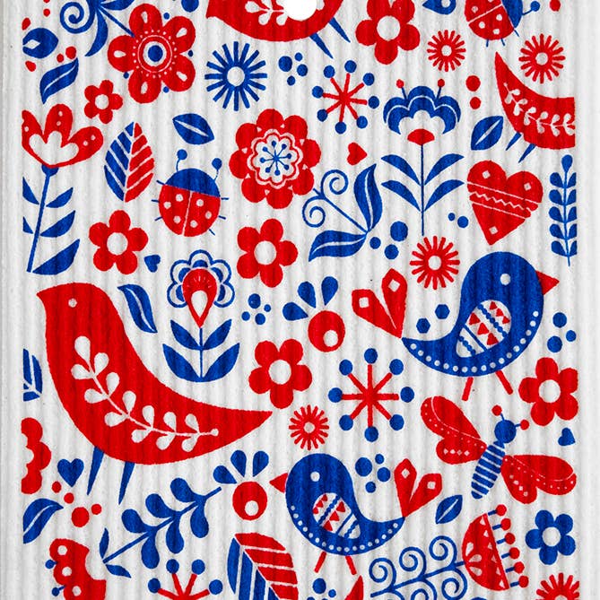 The Dish Cloth: Birds Bugs & Flowers Swedish Wash Towel showcases a vibrant Scandinavian folk art-inspired pattern with red and blue birds, flowers, hearts, and insects on a textured backdrop, perfectly blending beauty with functionality.