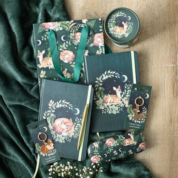 A medium gift bag featuring a charming fawn and forest animal print—a perfect way to present your green stationery items and themed gifts.