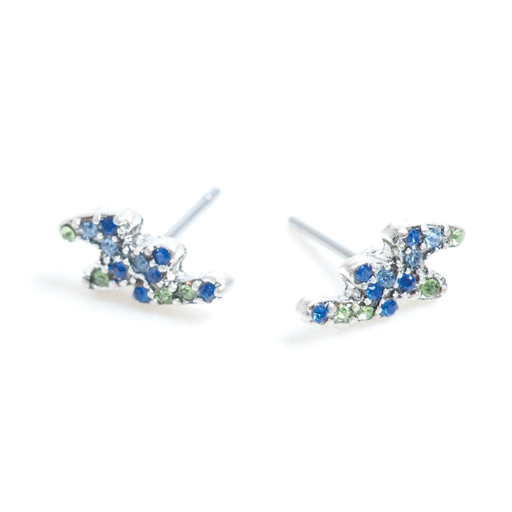 Introducing the Blue Northern Lights Earrings: small silver earrings with stunning blue and green gemstones in an abstract shape, capturing natures most dazzling display.