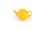 The Tea Pot: Yellow Earthenware Teapot 37-Ounce, featuring a lid and stay-cool handle, is shown on a white background.