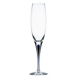 The Orrefors: Intermezzo Blue Flute 7oz, designed by Erika Lagerbielke, showcases elegance with its clear champagne flute, distinctive long stem, and subtle blue detail.