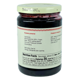 A glass jar of Swedish blueberry preserves with a red lid. The front label displays ingredients, nutrition facts, and company information.