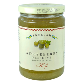 Jar of Swedish gooseberry preserve with a white lid and label showing gooseberries and blue-yellow flags.