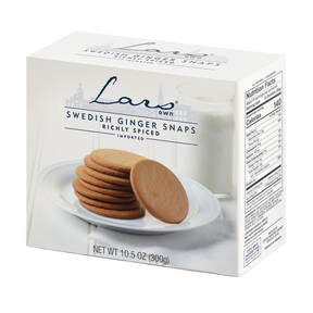 Box of Swedish pepparkakor with several cookies on a plate next to a glass of milk; nutrition facts and net weight 10.5 oz (300g) visible on the packaging.