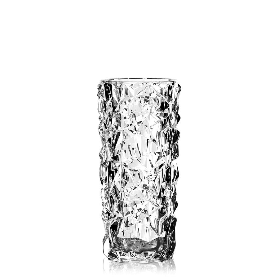 A tall, clear glass from the Orrefors: Carat 3 Piece Gift Set, featuring a textured crumpled surface pattern, stands upright against a white background.