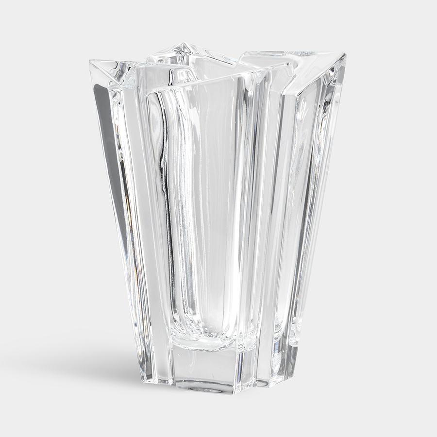 The Orrefors Glacial Vase Small is a crystal-clear glass piece with an angular, geometric design reminiscent of glacial formations on a plain background.