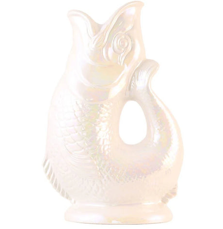 The Gluggle Jug: Gluggle Jug Lustre Made in Europe is a glossy white, fish-shaped pitcher with a lustre glaze and a handle formed by the fish’s curved tail.