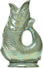 Gluggle Jug: Gluggle Jug Lustre Made in Europe—an iridescent ceramic fish-shaped pitcher with an open mouth and a handle formed by the curved body, finished in a lustre glaze.
