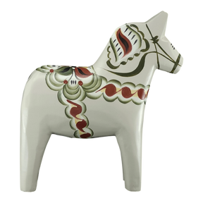 The Grannas Olsson Gray Swedish Dala Horse "Anders / Anniversary Series" (13 cm) is a handcrafted figurine from Sweden, beautifully painted and standing upright—exemplifying traditional Swedish craftsmanship.