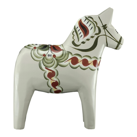 The Grannas Olsson Gray Swedish Dala Horse "Anders / Anniversary Series" (13 cm) is a handcrafted figurine from Sweden, beautifully painted and standing upright—exemplifying traditional Swedish craftsmanship.