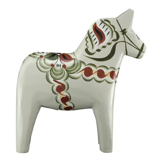 The Grannas Olsson Gray Swedish Dala Horse "Anders / Anniversary Series" (13 cm) is a handcrafted figurine from Sweden, beautifully painted and standing upright—exemplifying traditional Swedish craftsmanship.