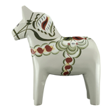 The Grannas Olsson Gray Swedish Dala Horse "Anders / Anniversary Series" (13 cm) stands upright, showcasing traditional Swedish craftsmanship and decorative patterns, handcrafted in Sweden.