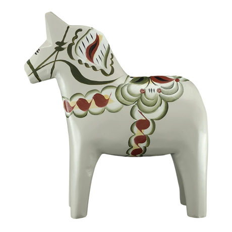 The Grannas Olsson Gray Swedish Dala Horse "Anders / Anniversary Series" (13 cm) stands upright, showcasing traditional Swedish craftsmanship and decorative patterns, handcrafted in Sweden.