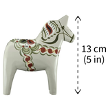 Gray Swedish Dala Horse "Anders" from Grannas Olsson, part of the Anniversary Series, handcrafted in Sweden with classic painted details, shown beside a dashed vertical line marking its 13 cm (5 in) height.