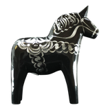 The Dala Horse: Black & Silver "Celebrate Series" by Grannas Olsson is a 13 cm handcrafted Swedish figurine, featuring silver patterns on black wood and inspired by traditional folk art.