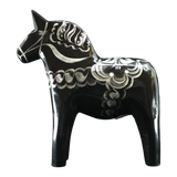 The Grannas Olsson Dala Horse: Black & Silver "Celebrate Series" is a 13 cm Swedish figurine, handcrafted in wood with silver decorative patterns, standing on four legs. Made by Grannas Olsson in Sweden.