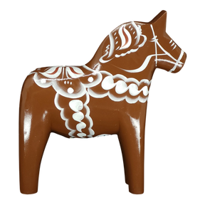 The Grannas Olsson Brown Swedish Dala Horse "Gingerbread" figurine, handcrafted in Sweden (13 cm/5 in), features white decorative patterns and stands upright on four legs, celebrating Scandinavian heritage.