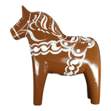 The Grannas Olsson Dala Horse: Brown Swedish "Gingerbread" (13 cm) features white and light brown patterns on handcrafted wood, celebrating Scandinavian heritage and Swedish artistry.