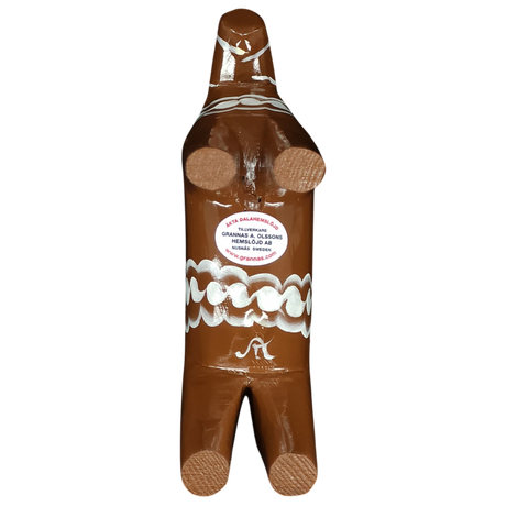 A brown, handcrafted Swedish Dala Horse "Gingerbread" (13 cm) by Grannas Olsson features stylized white details and is inspired by traditional woodcarving. Made in Sweden.