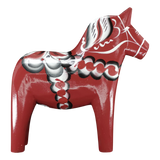 The Grannas Olsson Burgundy Swedish Dala Horse "Maria" (Anniversary Series, 15 cm) is handcrafted in Sweden and features white, black, and green patterns on its body while standing on all four legs.