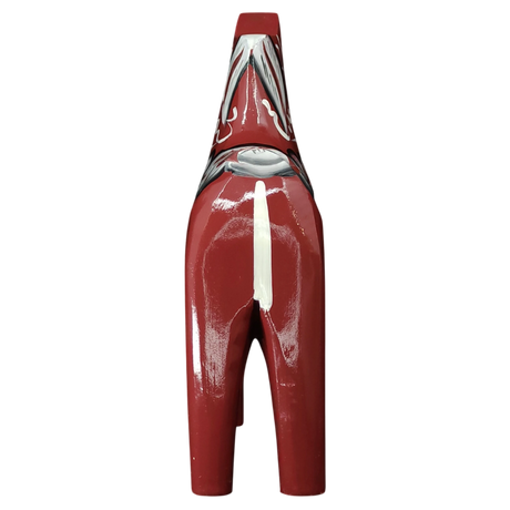 The Grannas Olsson Burgundy Swedish Dala Horse "Maria / Anniversary Series" (15 cm), handcrafted in Sweden, is shown from behind with black, white, and gray details against a plain white background.
