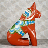 Dala Horse: Sitting Red Swedish Dala Horse | Handcrafted by Grannas A Olsson in Sweden