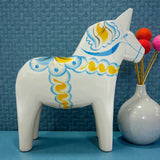 Dala Horse: White Swedish Dala Horse with Blue and Yellow "Swedish Flag Colors | Grannas A. Olsson Made in Sweden