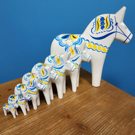 Dala Horse: White Swedish Dala Horse with Blue and Yellow "Swedish Flag Colors | Grannas A. Olsson Made in Sweden