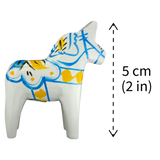 Dala Horse: White Swedish Dala Horse with Blue and Yellow "Swedish Flag Colors | Grannas A. Olsson Made in Sweden