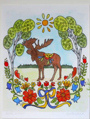 Greta Lann's "Dala Moose" 11x14 print features a brown moose standing on grass between trees under the sun, with vibrant flowers and a blue ribbon in a charming Swedish art style.