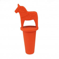 The Vinkork Red Dala Horse Wine Stopper features an orange, horse-shaped handle inspired by the Swedish Dala horse and is crafted from durable silicone.