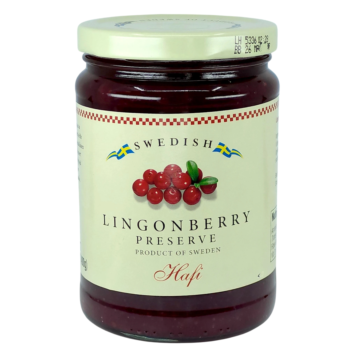 A jar with a cream label showing lingonberries and blue and yellow Swedish flags, referencing Scandinavian heritage.