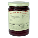 Jar with deep red preserves and a white label showing ingredients, nutrition facts, and storage instructions in English; “Swedish” visible on the packaging.