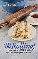 Keep on Rolling by Gary Legwold features rolled crepes with a rolling pin, tea cup, and blue bowl on marble. Discover lefse-making tips and learn about electric lefse grills to elevate your culinary skills.