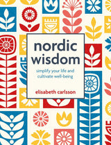 Book: Nordic Wisdom Simplify Your Life & Cultivate Well-Being by Elisabeth Carlsson features stylized red, yellow, and blue Scandinavian floral patterns on a white cover, reflecting the balanced Nordic approach to life and well-being.