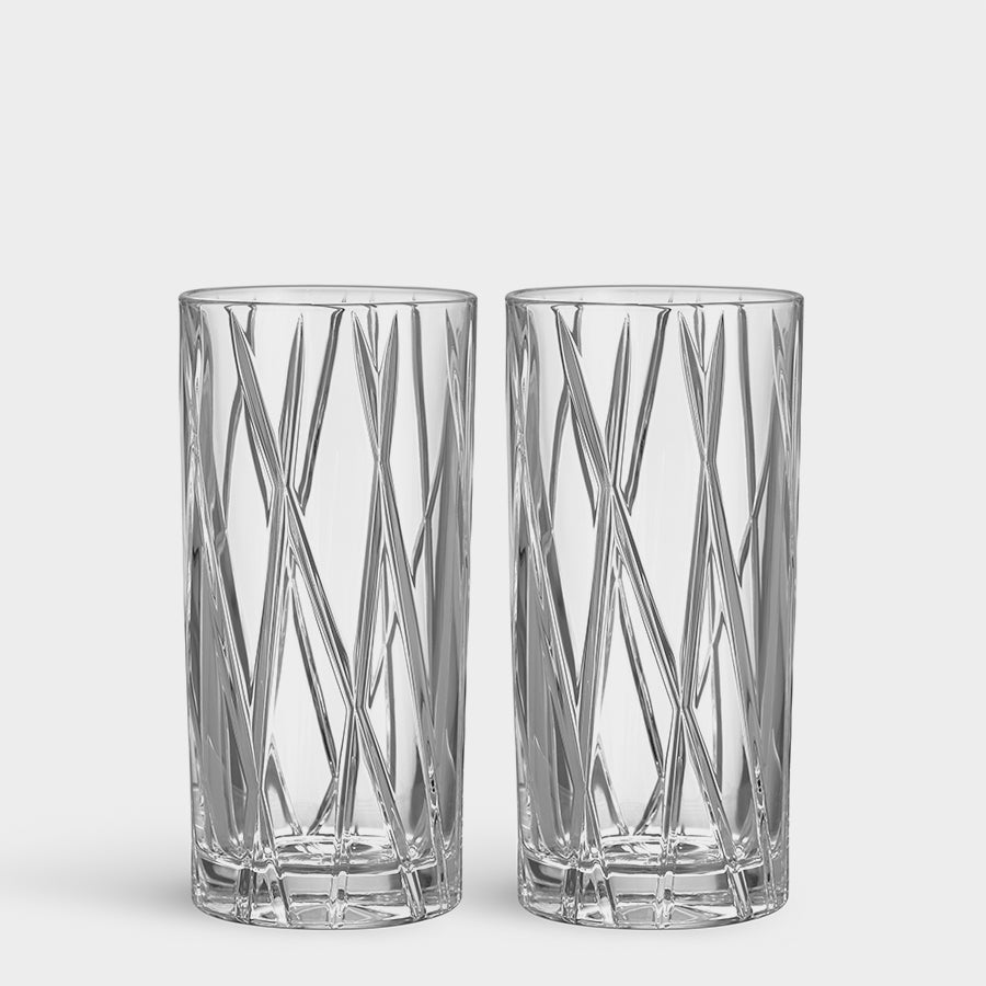 Two Orrefors City Highball Glasses, 12oz each with crisscross designs, arranged on a pristine white background.