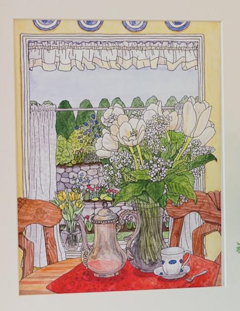 A watercolor featuring a cozy dining table highlights a vase of Easter flowers, alongside a teapot and a teacup. Outside the window, Greta Lann’s "Easter Flowers" artwork beautifully depicts trees poised for an Easter egg hunt amid blooming garden flowers.