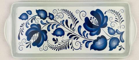 Product Name: Tray: Blue Folk Art Flowers - A rectangular serving tray featuring blue folk art flowers on a white background, with large blossoms and swirling leaves, ideal for presenting an almond cake.