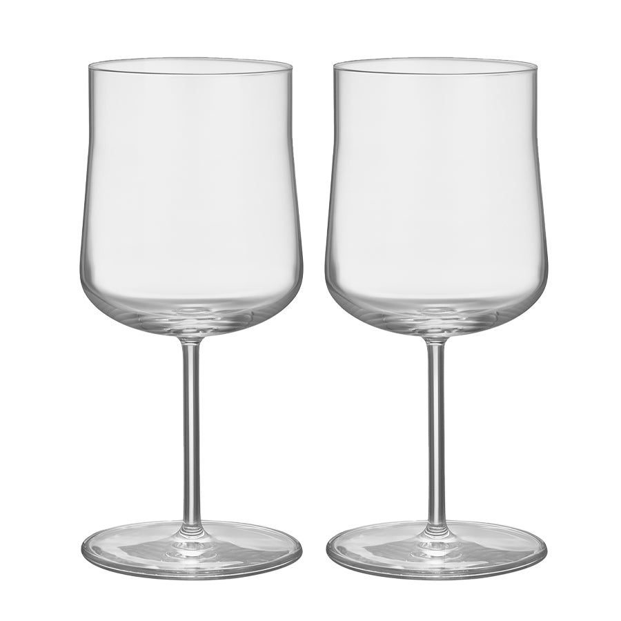 Two Orrefors: Informal Glass XL 20oz, clear wine glasses with tapered bowls, set side by side on a white background, showcase Scandinavian design inspired by Björn Dahlström.