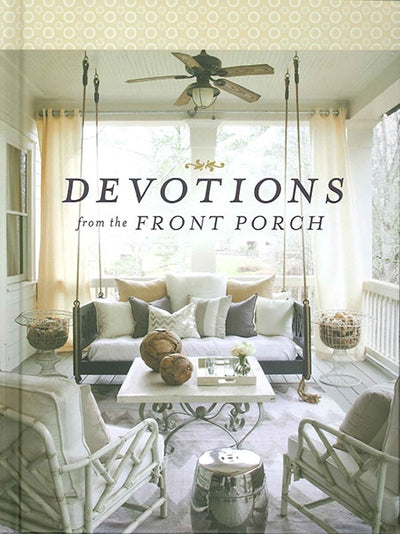 The cozy front porch seating area features a couch, swing, pillows, chairs, and a table. The image is beautifully overlaid with the text "Devotions from the Front Porch" by Stacy Edwards, making it an ideal gift book for those who cherish tranquil moments.